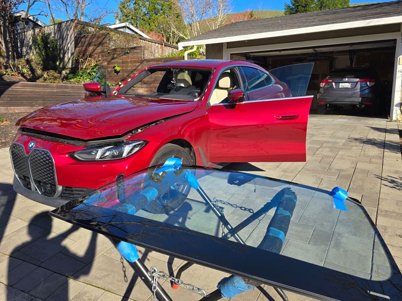 BMW iX windshield prepared on stand